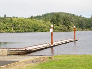 a pier extends next to a boat ramp on Cullaby Lake