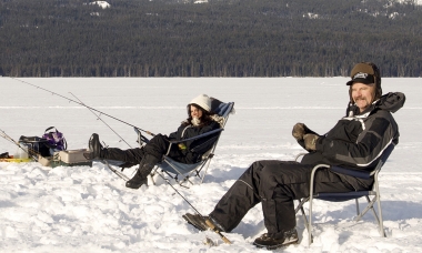 Two anglers ice fishing on Diamond Lake